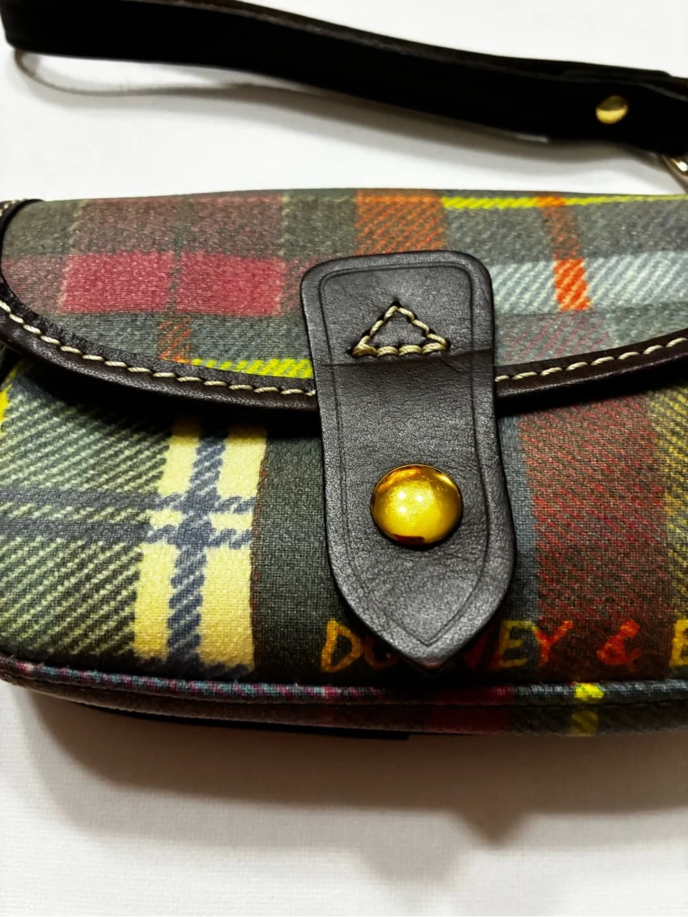 Dooney & Bourke  EUC Multicolor Plaid Crossbody Logo Charm Brown  Leather Strap